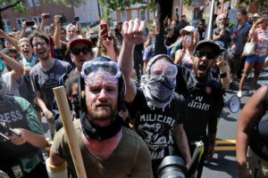 CHARLOTTESVILLE, VA - AUGUST 12:  Anti-fascist counter-protesters wait outside Lee Park to hurl insluts as white nationalists, neo-Nazis and members of the "alt-right" are forced out after the "Unite the Right" rally was declared an unlawful gathering August 12, 2017 in Charlottesville, Virginia. After clashes with anti-fascist protesters and police the rally was declared an unlawful gathering and people were forced out of Lee Park, where a statue of Confederate General Robert E. Lee is slated to be removed.  (Photo by Chip Somodevilla/Getty Images)
